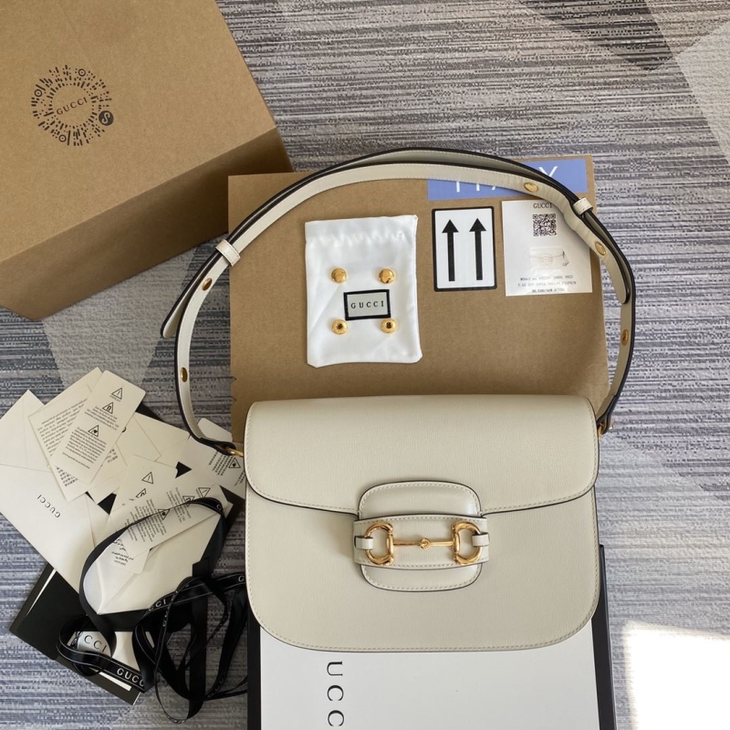 G*u*i top handle bags